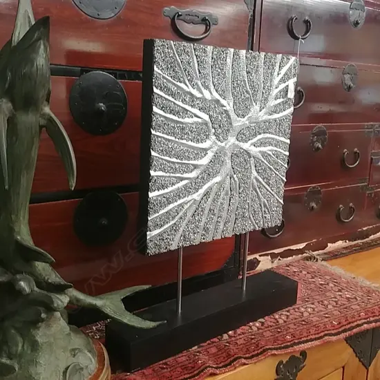 SILVER ART PIECE ON STAND