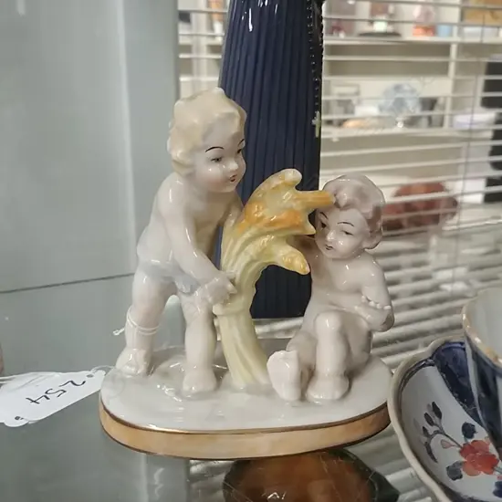 CAPODIMONTE PUTTI ORN.