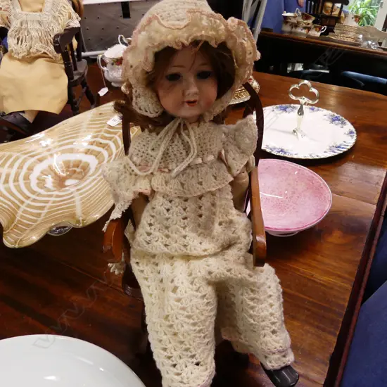 ANTIQUE CHINA DOLL IN CHAIR