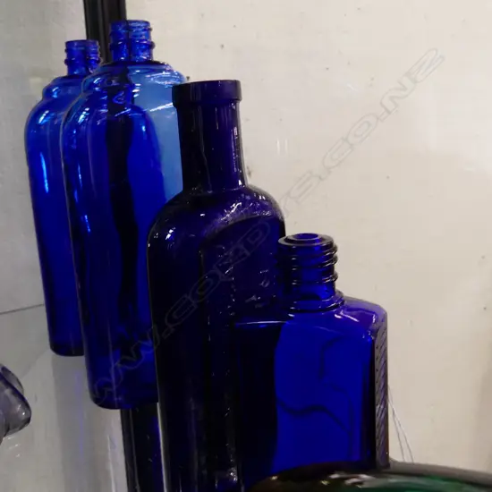 4 VINTAGE BLUE BOTTLES