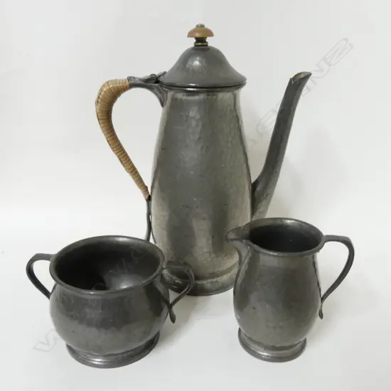 A three piece Tudric pewter coffee set