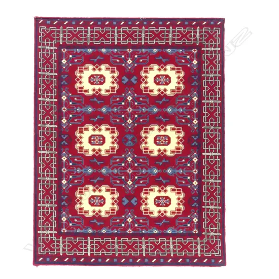 A hand embroidered panel depicting a Baluchi design