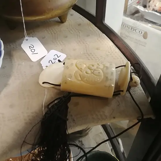 BONE INRO WITH FISH CARVINGS