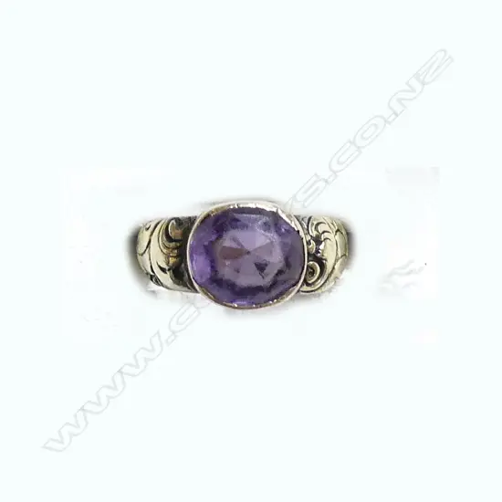 9CT GOLD AND AMETHYST RING (3.5gm)