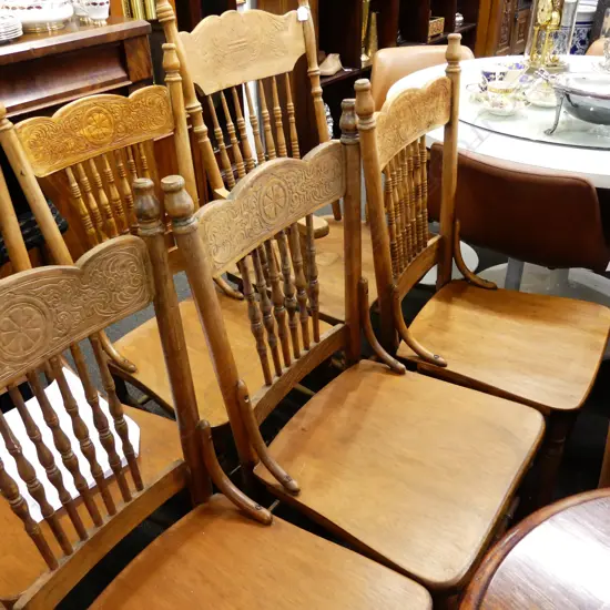 SET OF EIGHT CANADIAN SPINDLE BACK CHAIRS