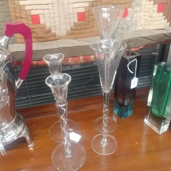 FOUR AIRTWIST GLASS CANDLESTICKS