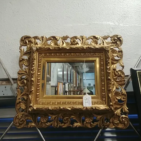 SMALL GILT FRAMED MIRROR