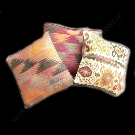 Three kilim faced cushions
