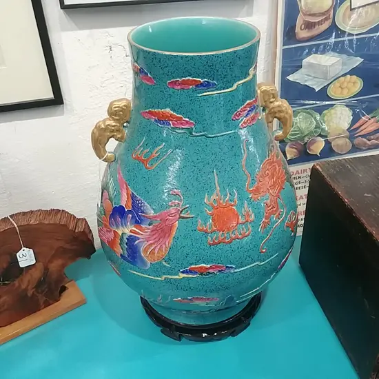 LARGE COLOURFUL DOUBLE HANDLED VASE ON STAND