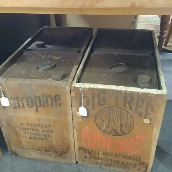 2 OIL CRATES WITH 4 OIL CANS