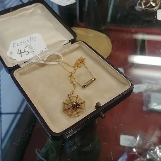 GOLD SPIDER WEBB PENDANT WITH CHAIN TESTS AS 10CT
