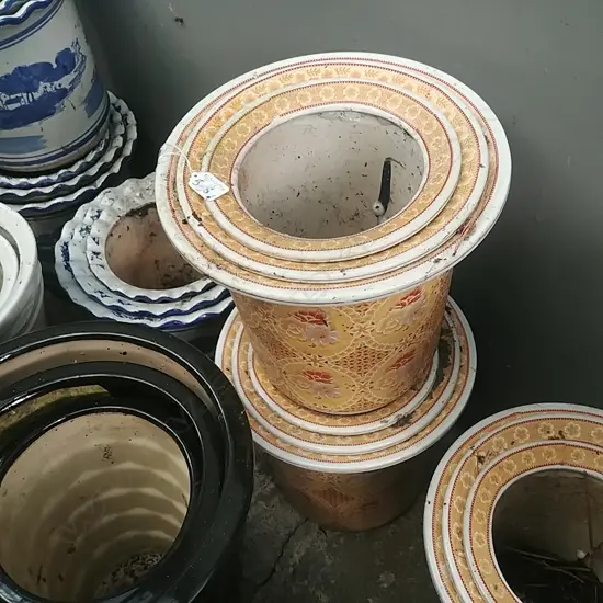 2 SETS OF 3 GRADUATED YELLOW PLANT POTS (6)