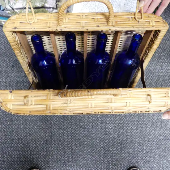 4 BLUE BOTTLES IN CANE WINE CARRIER