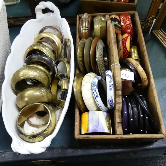 2 TRAYS OF BANGLES; BRASS & BONE; WOOD