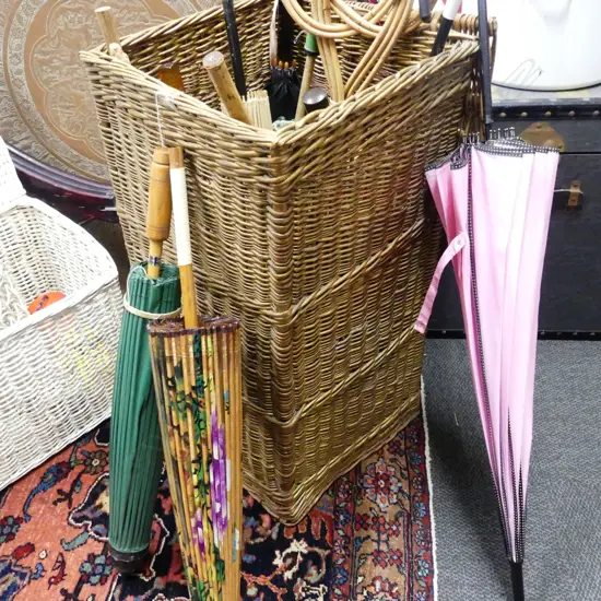 CANE BASKET;  WITH ORIENTAL PARASOLS AS IS