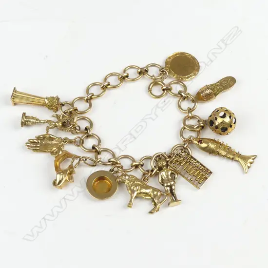 14CT VINTAGE CHARM BRACELET 18, 14 & 9CT CHARMS 31.9GM