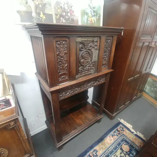 OAK CARVED TALL CUPBOARD