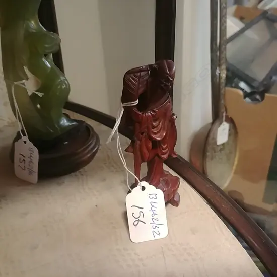 SMALL ORIENTAL CARVED FIGURE