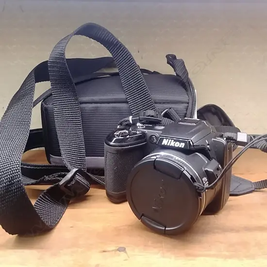 NIXON 'COOLPIX' DIGITAL CAMERA 