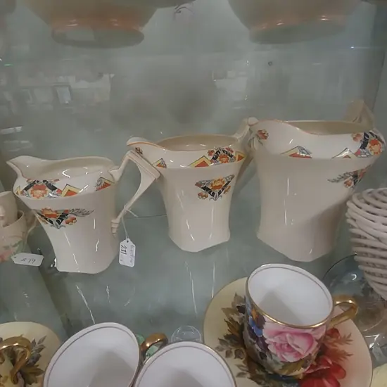 SET OF 3 GRADUATED MEAKIN JUGS 