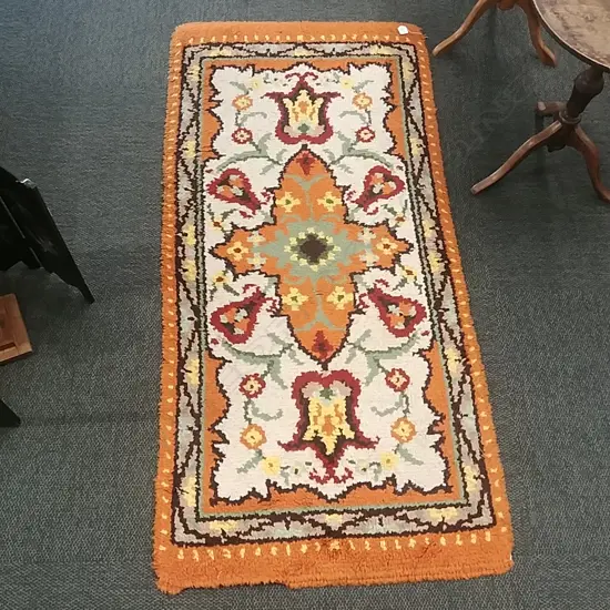 SMALL ORANGE RUG