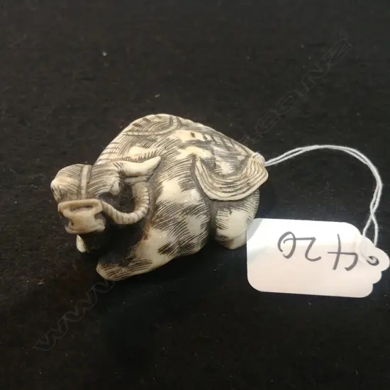 JAPANESE CARVED BONE NETSUKE BUFFALO