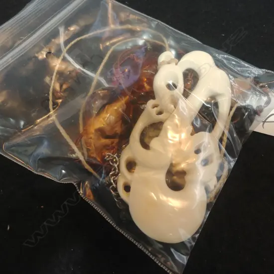 CARVED BONE PENDANT & AMBER TYPE NECKLACE