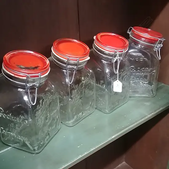 4 GLASS STORAGE CONTAINERS 