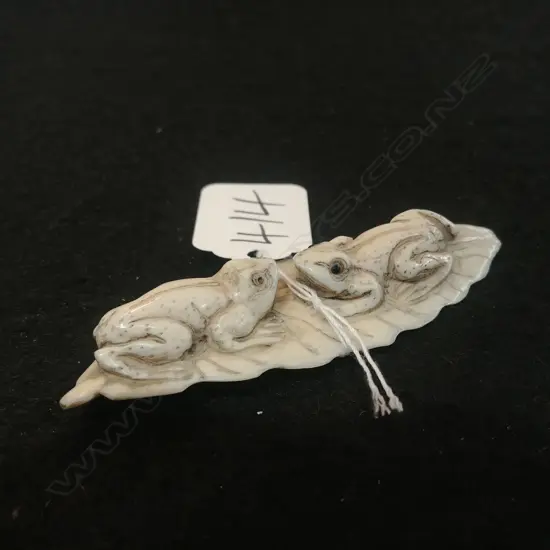 JAPANESE CARVED BONE NETSUKE 2 FROGS LEAF
