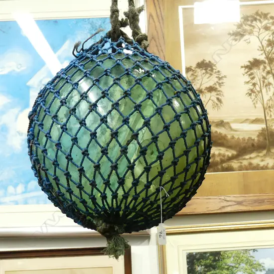 OLD GLASS FISHING FLOAT WITH NETTING