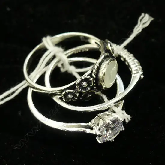 THREE SILVER RINGS