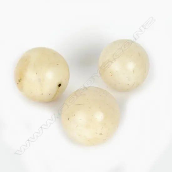 3 IVORY BALLS