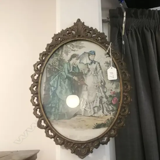 SMALL OVAL LITHOGRAPH IN METAL FRAME