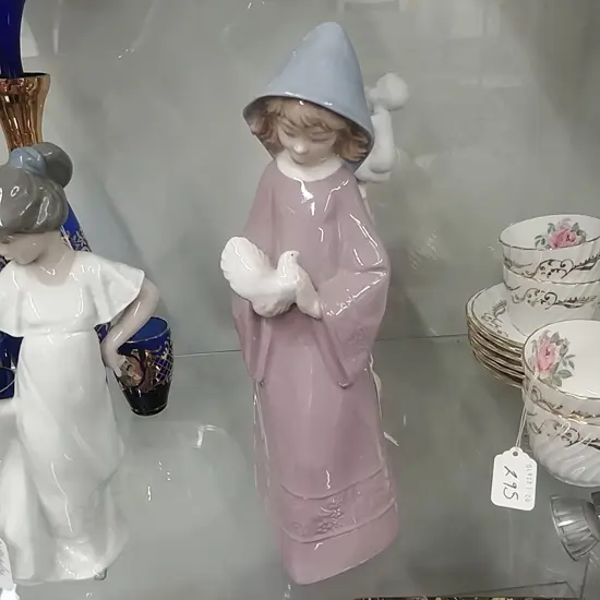 NAO FIGURE OF A GIRL WITH BIRD