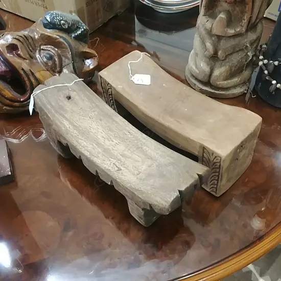 2 CARVED WOOD HEAD RESTS