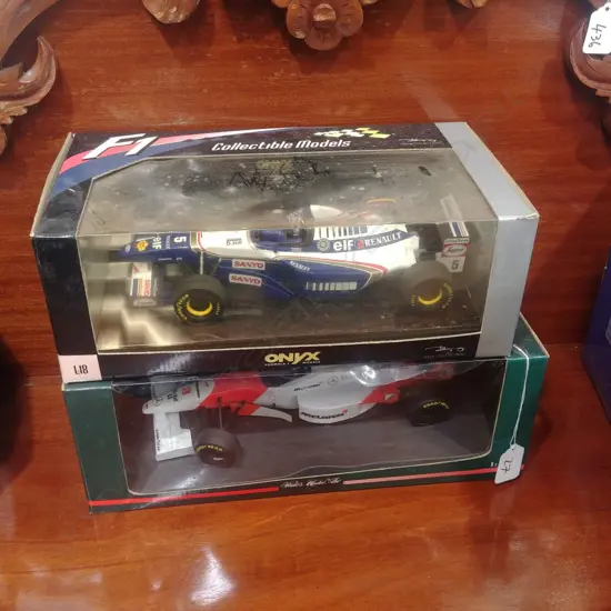 2 BOXED F1 RACE CAR MODELS 