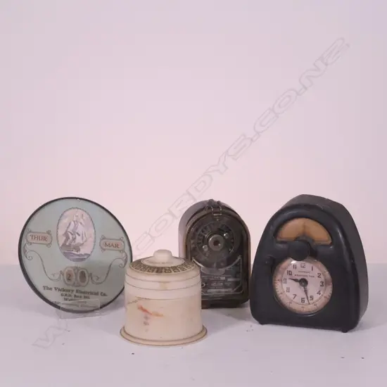 CALENDAR TRIVET, BAKELITE RADIOTRON, 2 ELECTRIC CLOCKS;HORSEMAN & HAWKEYE MEASURED TIME, TALLEST H. 150MM, SOME FAULTS