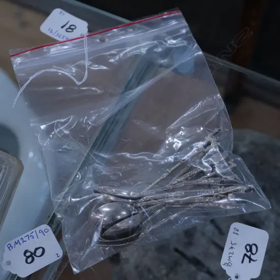 TWELVE .900 STANDARD SILVER COFFEE SPOONS