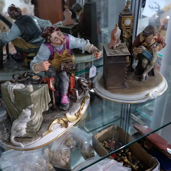 TWO FIGURE SETS COBBLER AND CLOCKMAKER (A/F) 