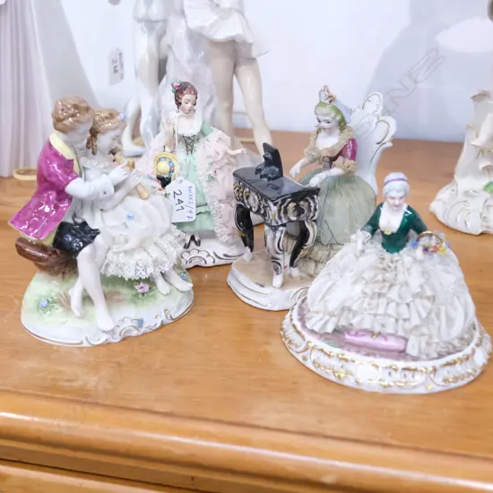 4 GERMAN FIGURINES