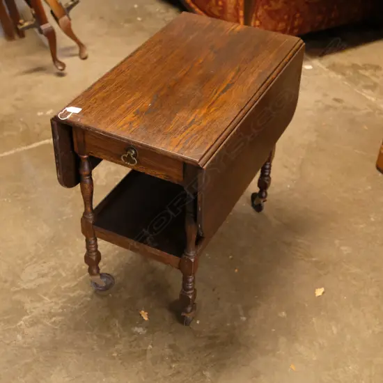AN OAK DROPSIDE TEA TROLLEY L 710 MM