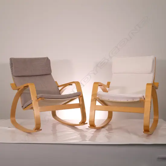 TWO DESIGNER PALE BEECH PLY ROCKING CHAIRS