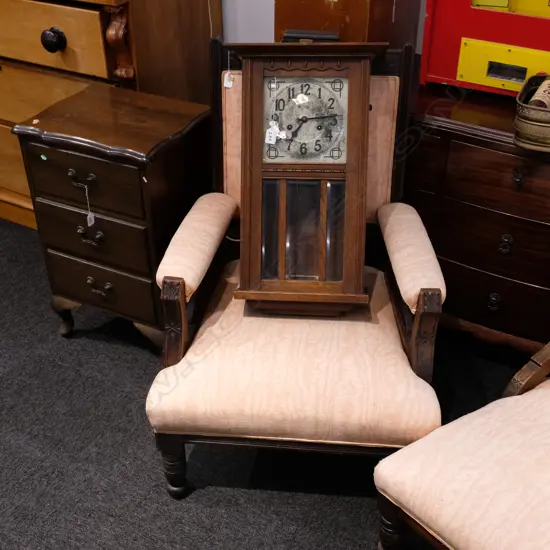 AN EDWARDIAN GRANDFATHER CHAIR