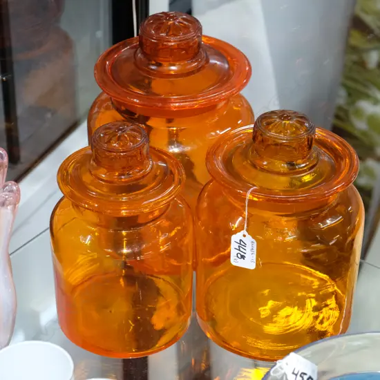 3 RETRO ORANGE LIDDED GLASS JARS