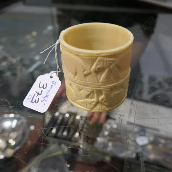 2 IVORY CARVED NAPKIN RINGS