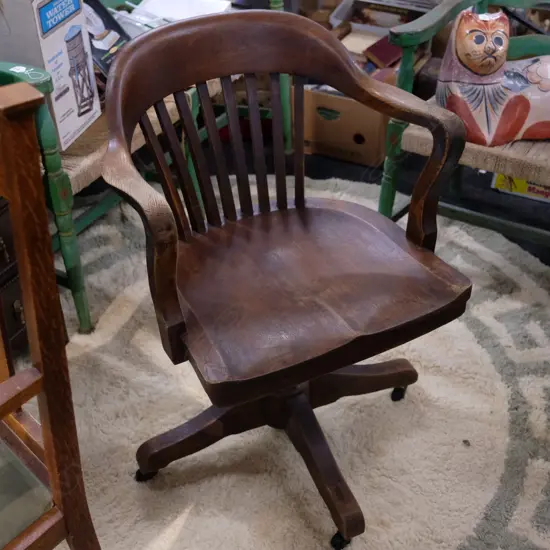 C. 1920S AMERICAN OAK BANKERS CHAIR BRANDED SIKES