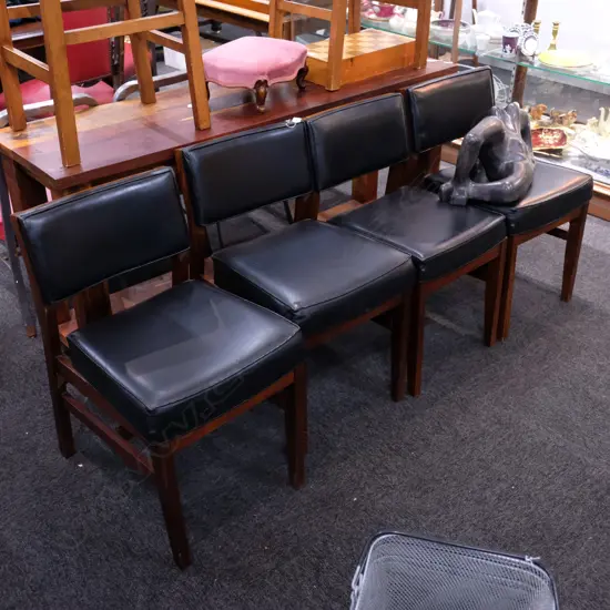 FOUR RETRO BLACK VINYL DINING CHAIRS