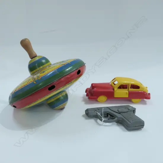 TIN PLATE SPINNING WHEEL / CAP GUN / EARLY PLASTIC CAR