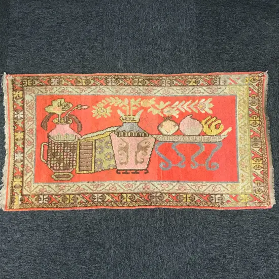 NGAIRE HART ESTATE COLLECTION: TEXTILES: OLD (NEPAL?) HAND KNOTTED MAT w ORIENTAL VASE DECORATION 1300 X 700mm