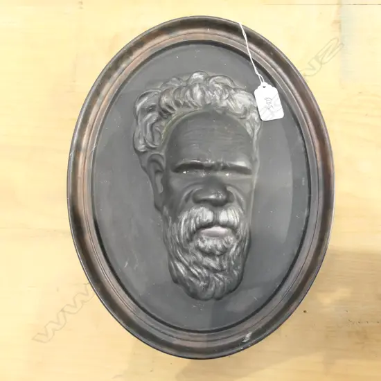 OVAL WALL PLAQUE OF AN ABORIGINAL MAN L 300 MM